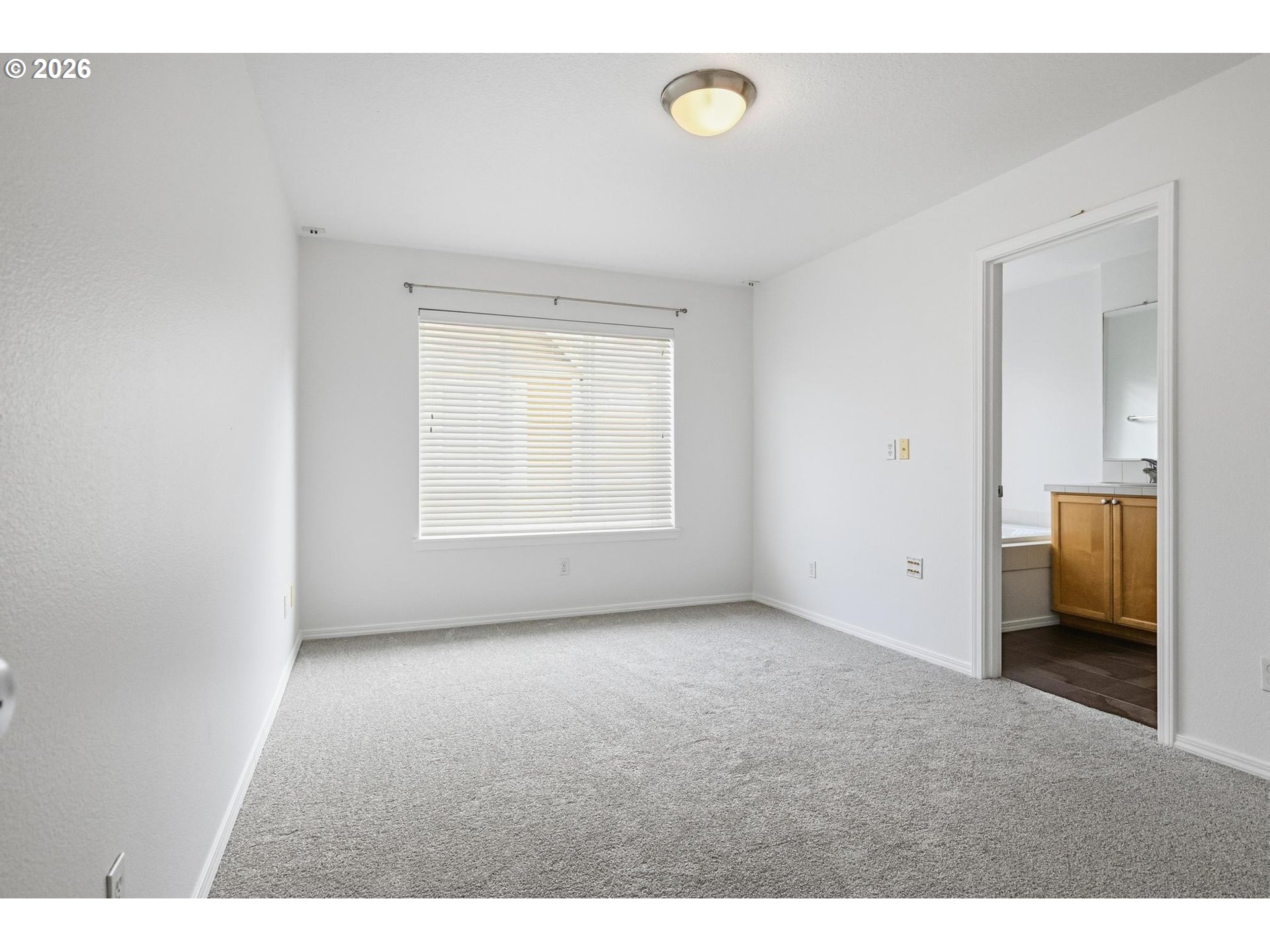 1638 Southwest 173rd Terrace Beaverton, OR 97003 - Photo 20 of 41 a view of an empty room with a window