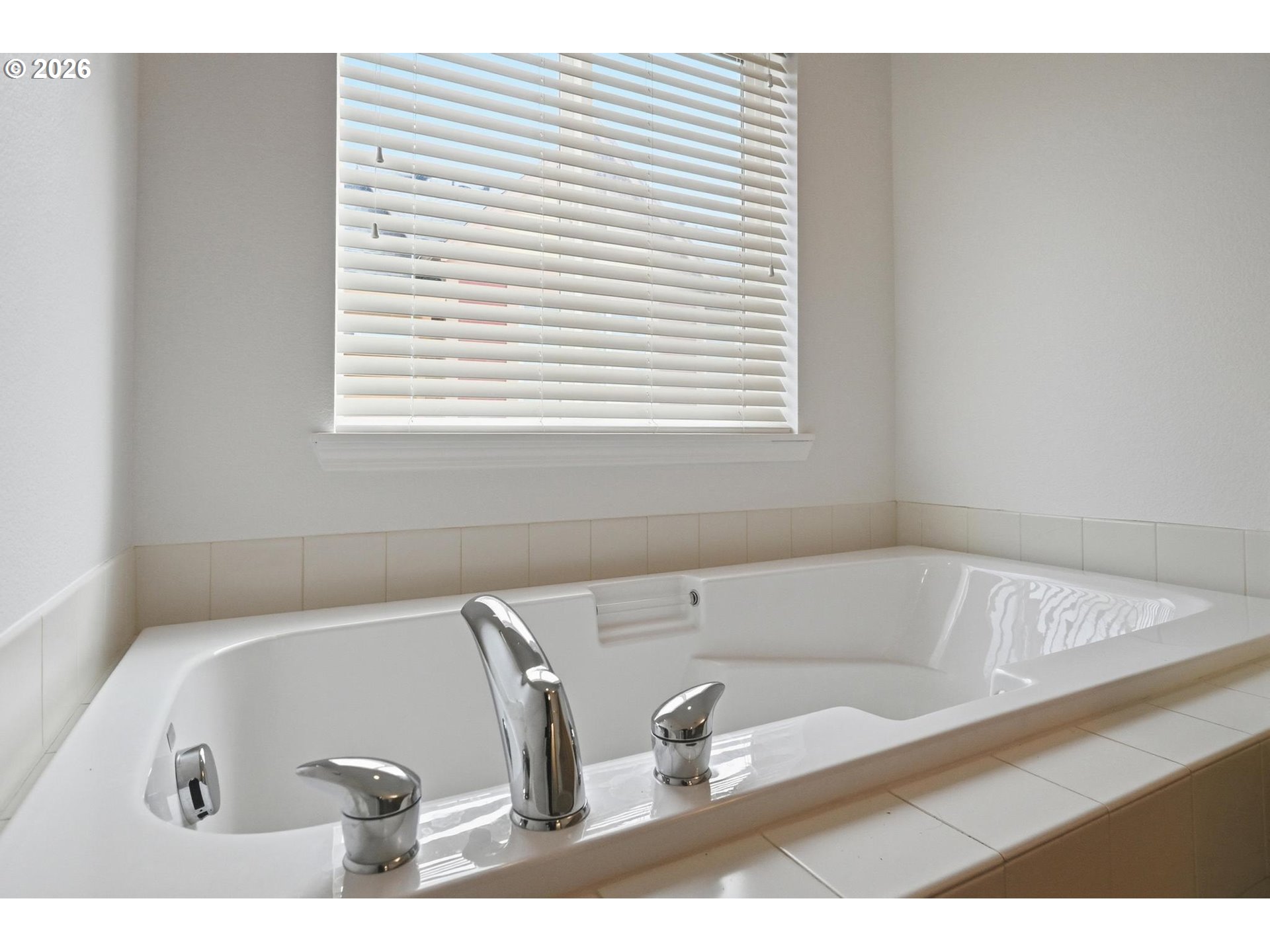 1638 Southwest 173rd Terrace Beaverton, OR 97003 - Photo 23 of 41 a bathroom with a bathtub