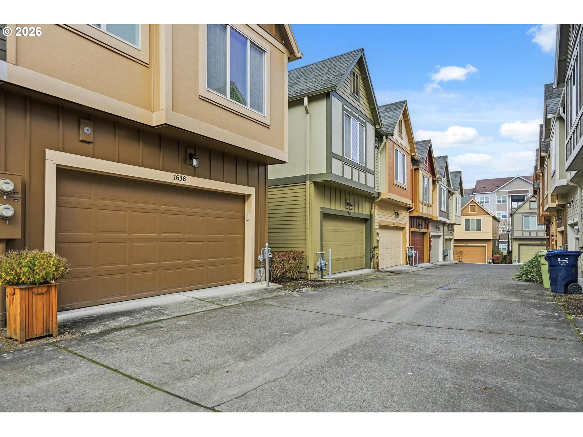1638 Southwest 173rd Terrace Beaverton, OR 97003 - Photo 35 of 41 a view of a blue house with many windows
