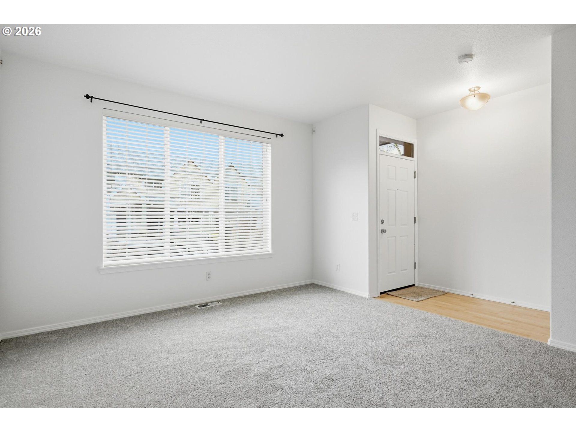 1638 Southwest 173rd Terrace Beaverton, OR 97003 - Photo 4 of 41 an empty room with windows