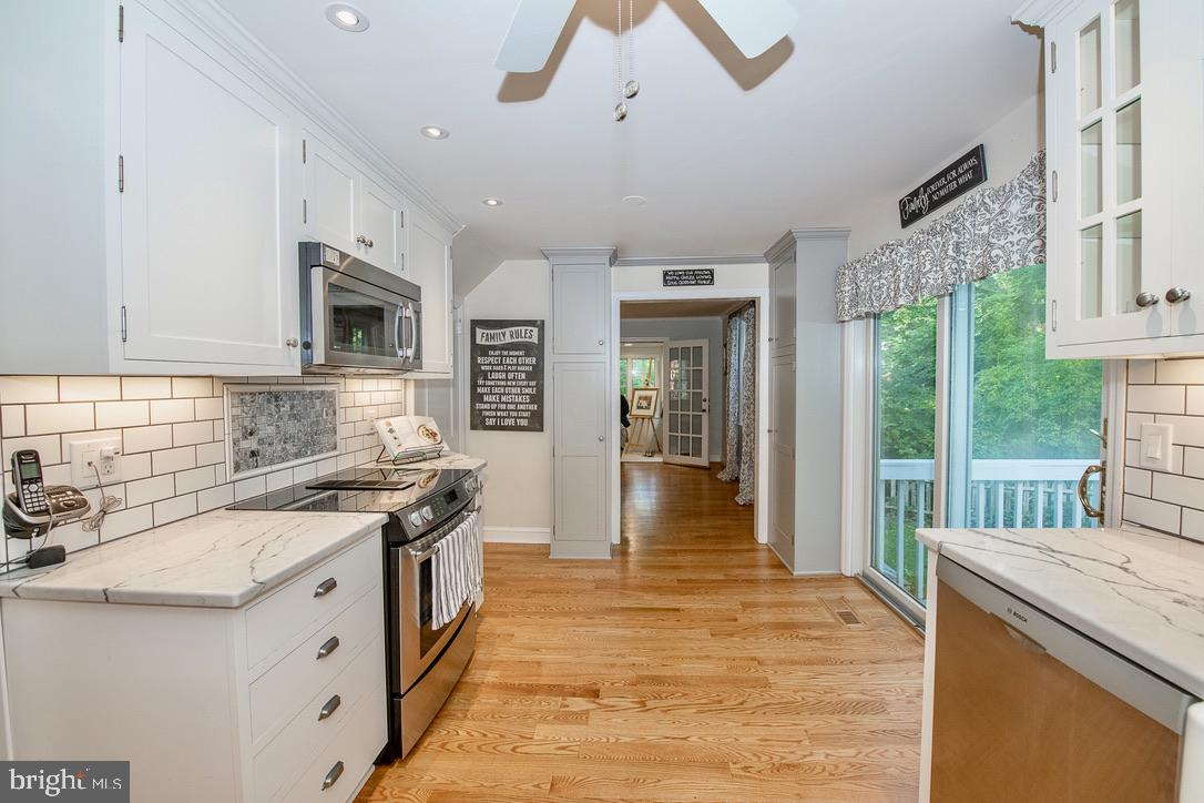 1 Forest Road Wayne, PA 19087 - Photo 14 of 38 New hardwood floors throughout and doors to deck