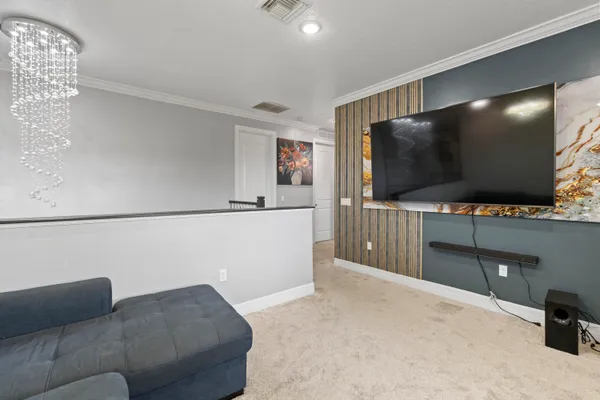 a kitchen with kitchen island a counter space a sink and appliances