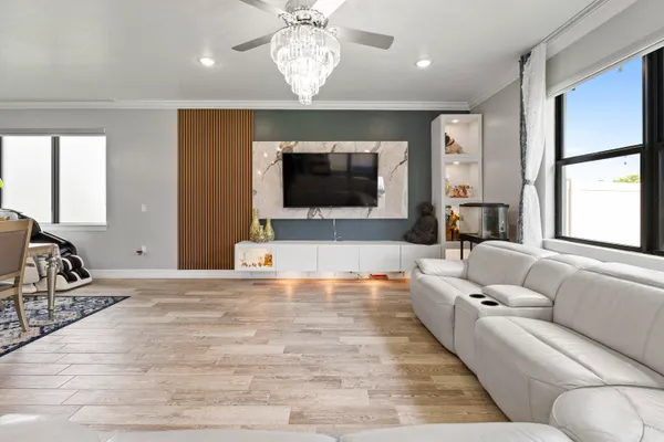 a view of hallway with wooden floor