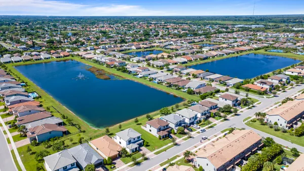 swimming pool with outdoor seating and yard