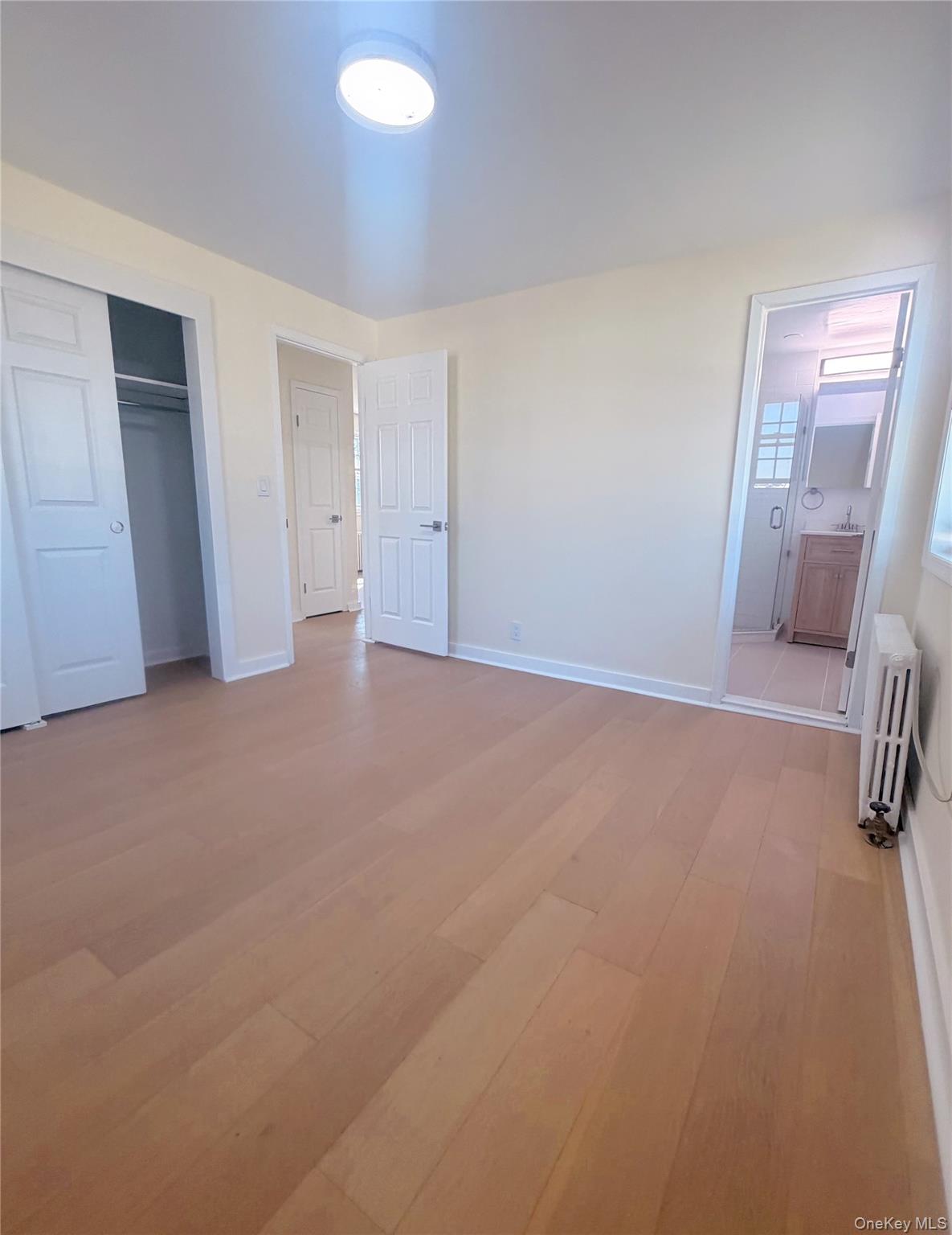 64-11 Springfield Boulevard, Unit B Queens, NY 11364 - Photo 4 of 11 a view of an empty room