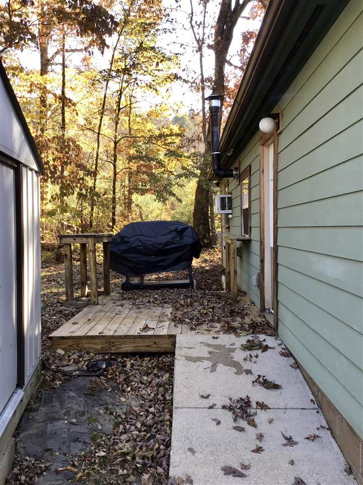 4192 Morrison Creek Road Clifton, TN 38425 - Photo 6 of 25 Storage Shed, BBQ Grilling area
