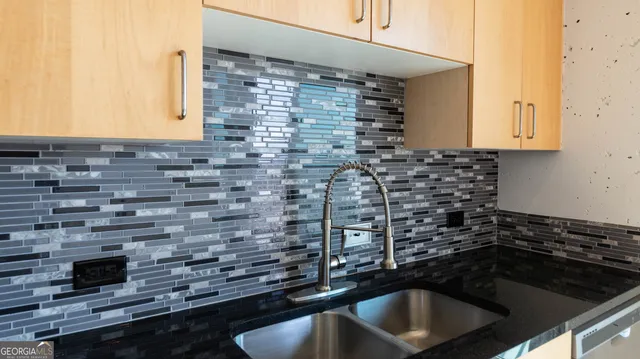a view of a kitchen from the hallway with a stove