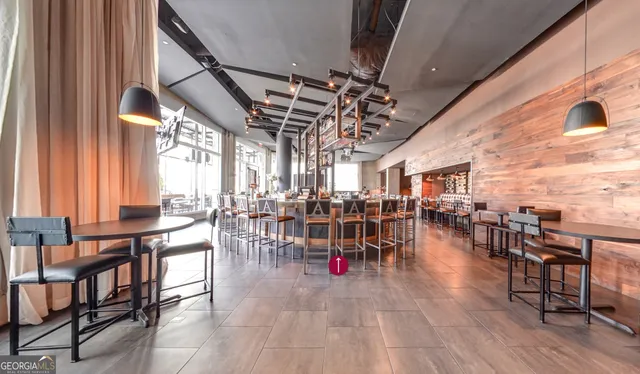 a view of a lake with a bench next to a lake
