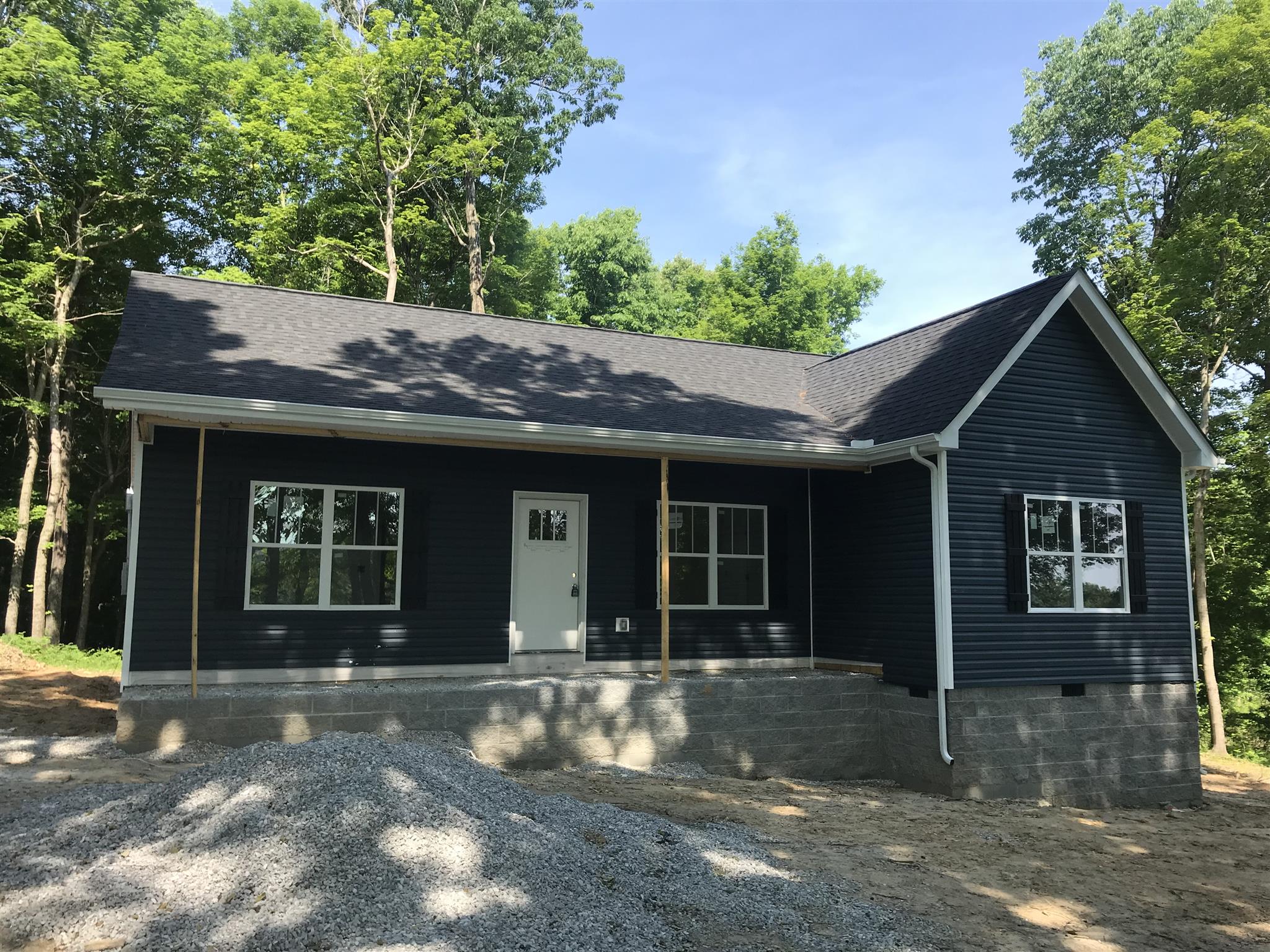 1360 Cowan Road Dickson, TN 37055 - Photo 4 of 19 a view of a house with a yard