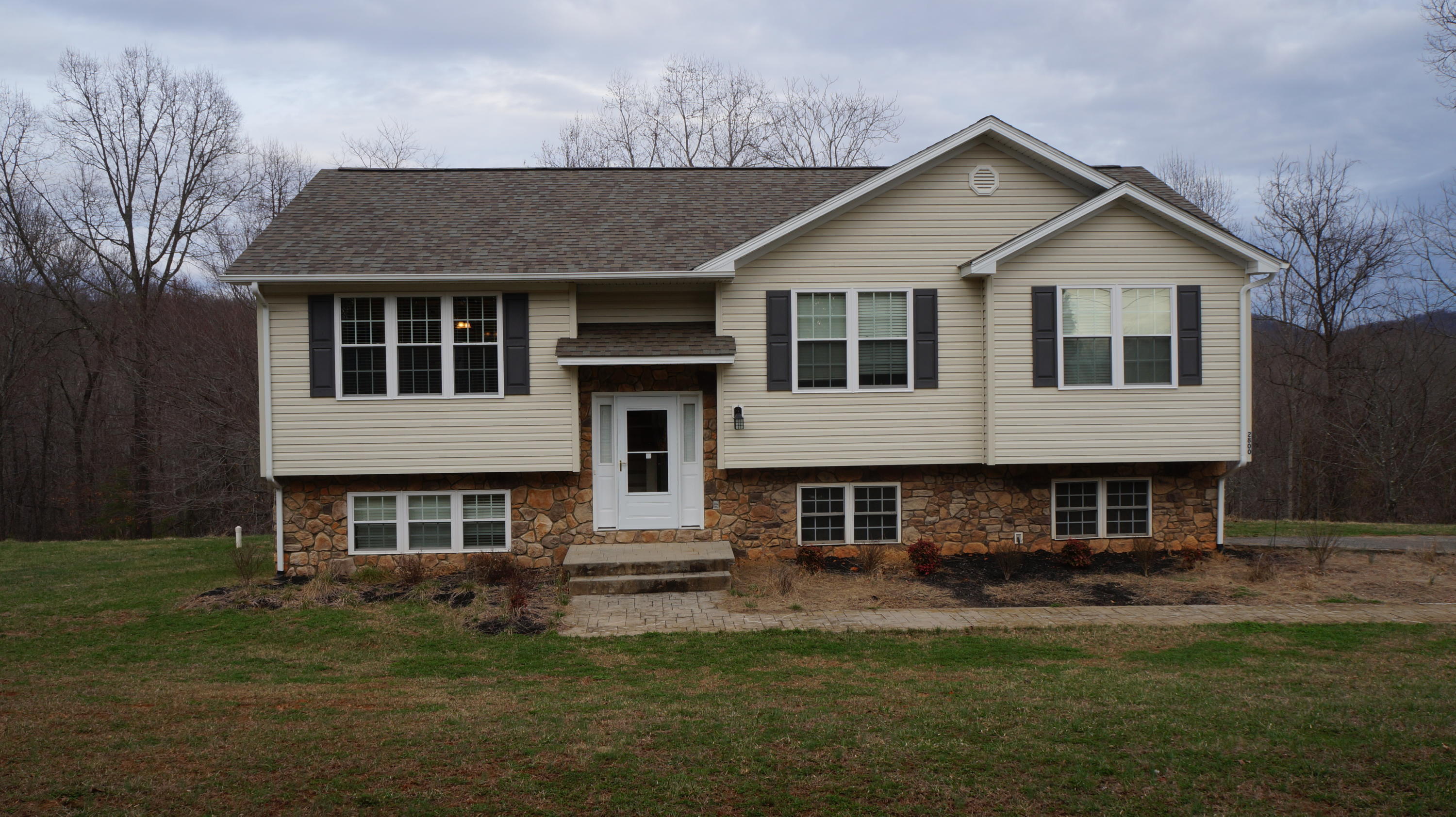 2800 Nemmo Road Vinton, VA 24179 - Photo 11 of 11 a front view of a house with a garden