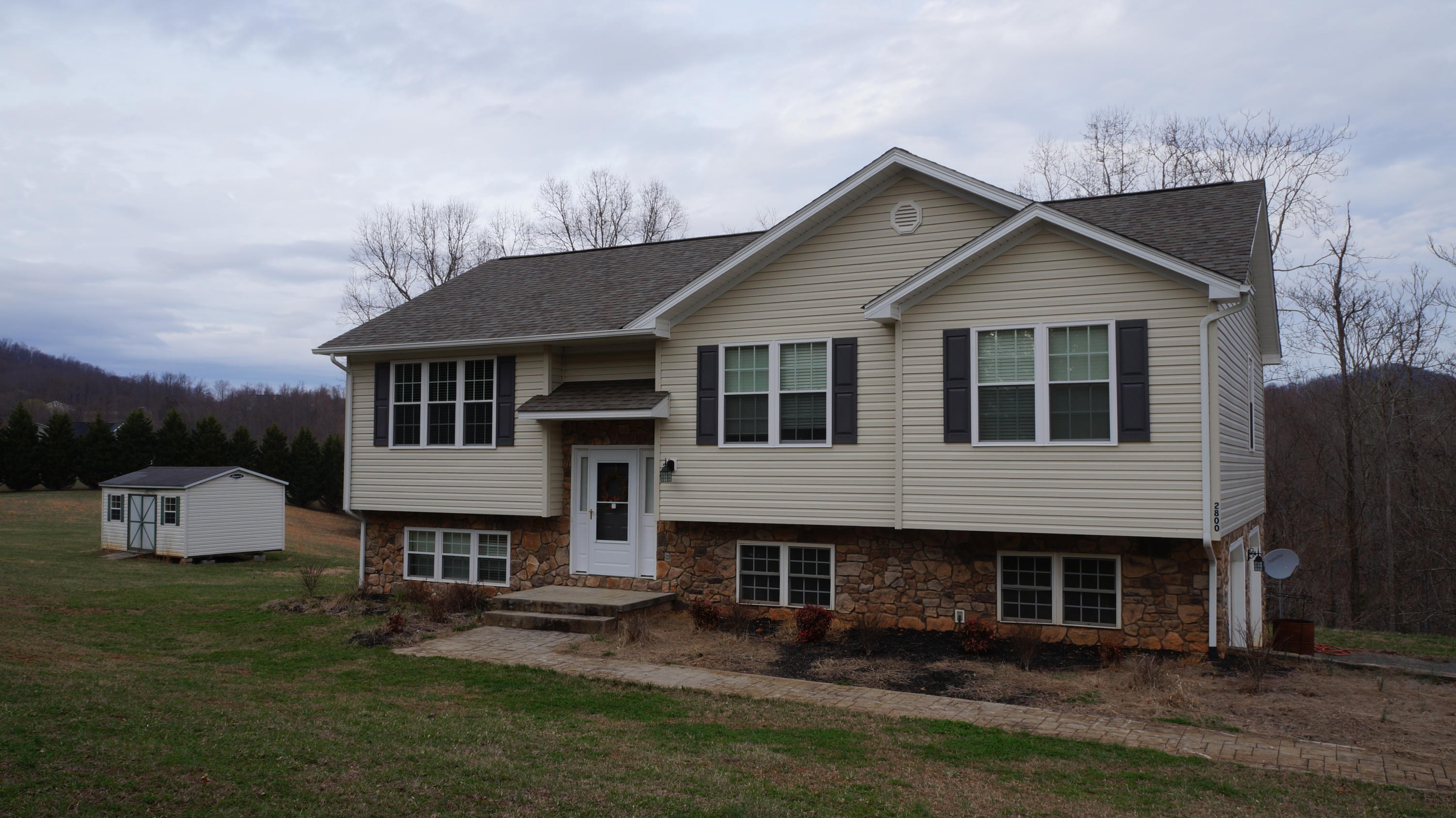 2800 Nemmo Road Vinton, VA 24179 - Photo 2 of 11 a front view of a house with a yard