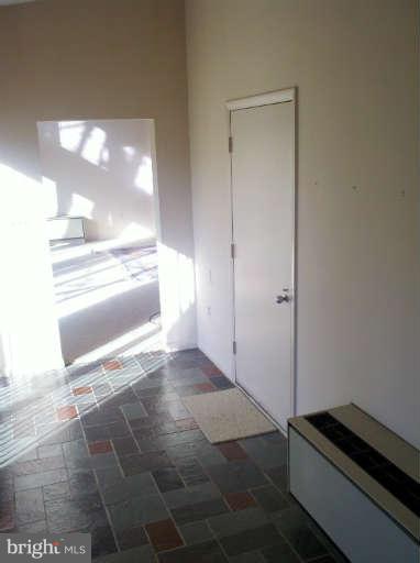 10530 Stevenson Road Stevenson, MD 21153 - Photo 16 of 29 a view of kitchen and empty room