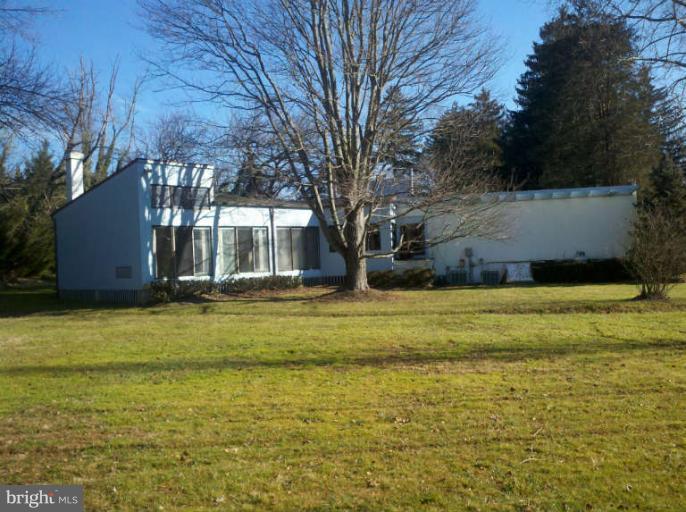 10530 Stevenson Road Stevenson, MD 21153 - Photo 4 of 29 a swimming pool with outdoor seating and yard