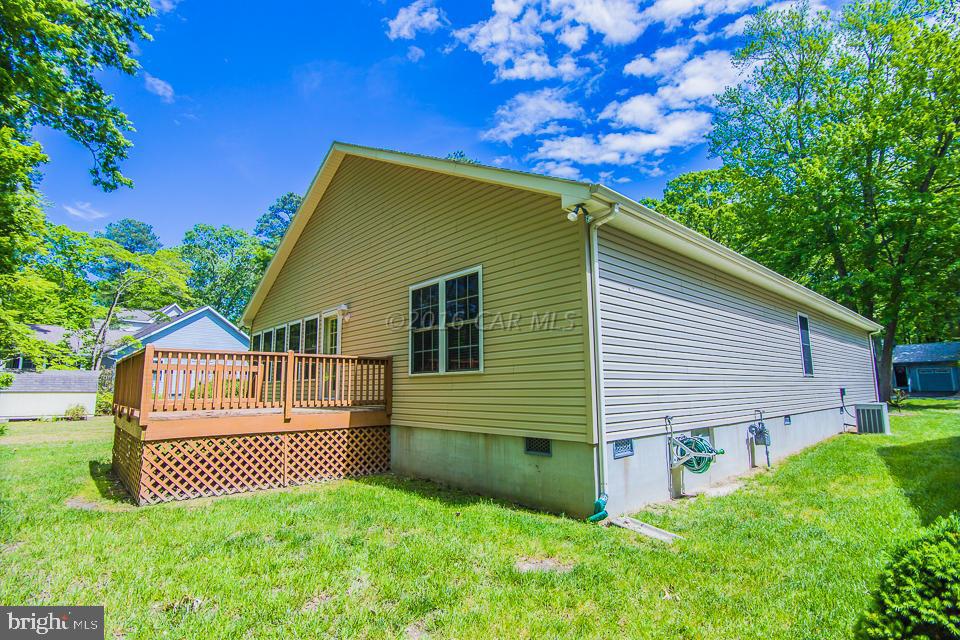 217 Windjammer Road Ocean Pines, MD 21811 - Photo 2 of 47 a view of a house with a yard
