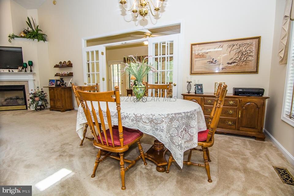217 Windjammer Road Ocean Pines, MD 21811 - Photo 12 of 47 a view of a dining room with furniture