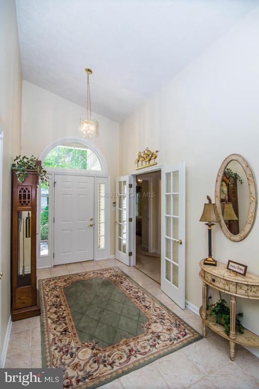 217 Windjammer Road Ocean Pines, MD 21811 - Photo 15 of 47 a very nice looking room with a rug