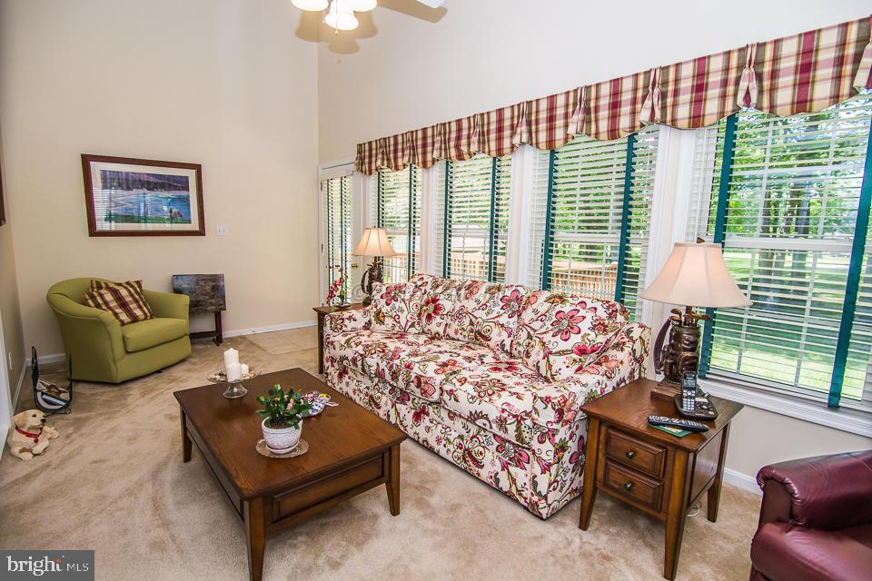 217 Windjammer Road Ocean Pines, MD 21811 - Photo 42 of 47 a living room with furniture and a large window
