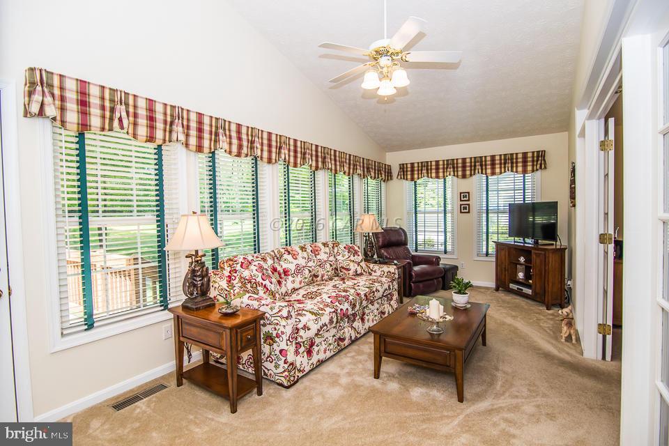 217 Windjammer Road Ocean Pines, MD 21811 - Photo 43 of 47 a living room with furniture and a large window
