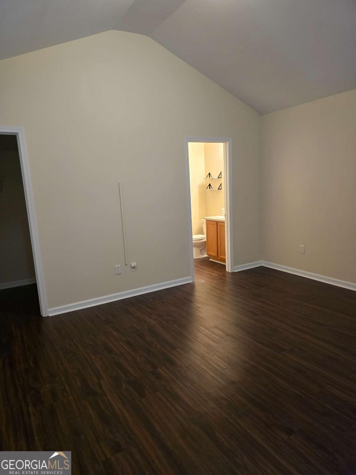 13 Rice Mill Road Port Wentworth, GA 31407 - Photo 12 of 21 a view of an empty room with wooden floor and a window