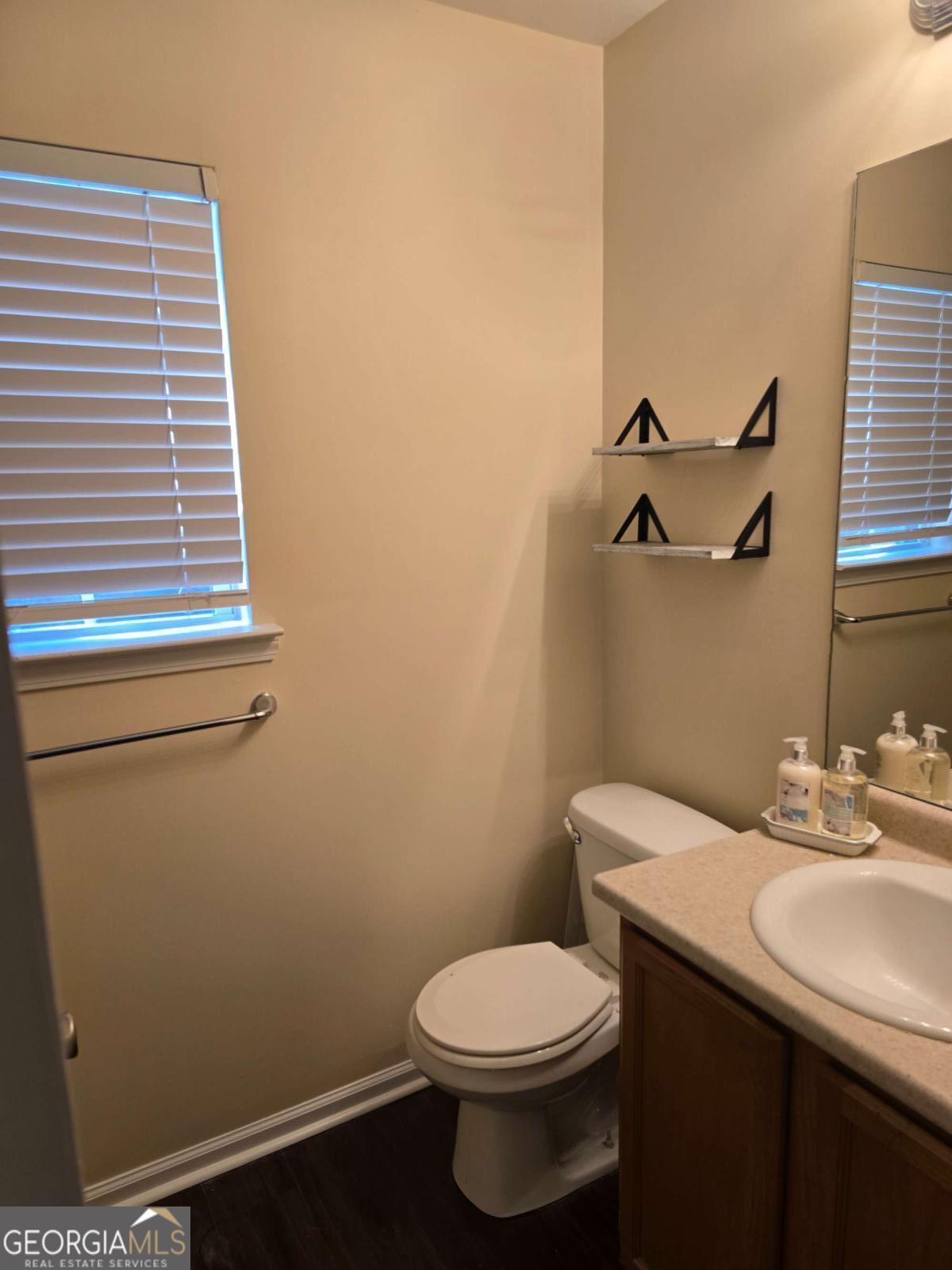 13 Rice Mill Road Port Wentworth, GA 31407 - Photo 14 of 21 a bathroom with a sink and a toilet