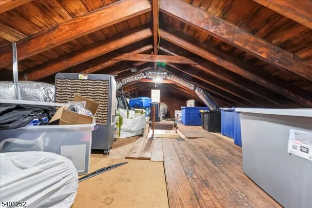 a view of a patio with a table and chairs