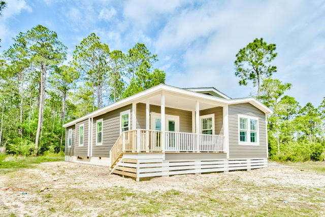 455 North County 395 Santa Rosa Beach, Unit 1 Santa Rosa Beach, FL 32459 - Photo 13 of 13 a front view of a house with a yard