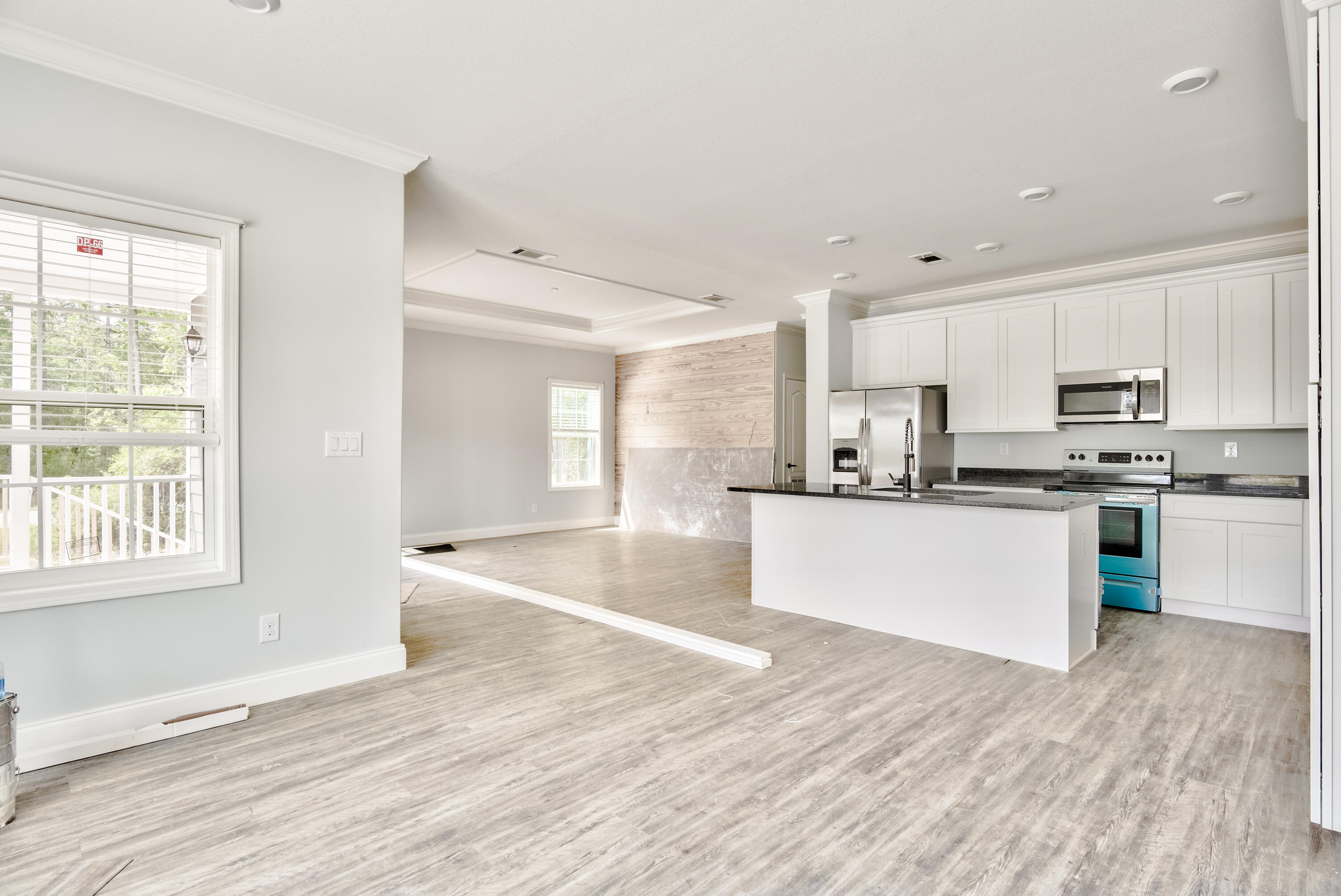 455 North County 395 Santa Rosa Beach, Unit 1 Santa Rosa Beach, FL 32459 - Photo 4 of 13 a view of kitchen with granite countertop stainless steel appliances counter space and a window