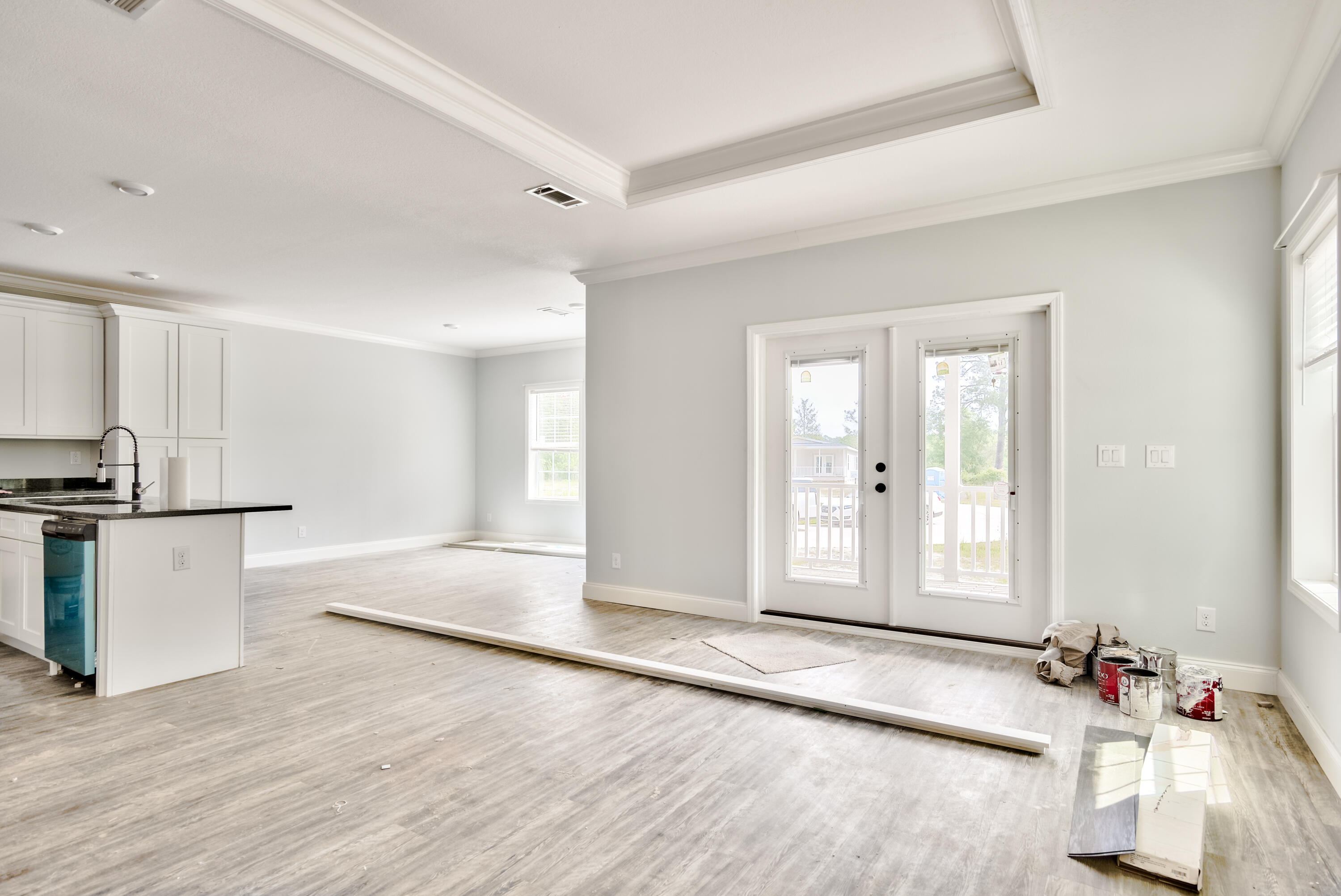 455 North County 395 Santa Rosa Beach, Unit 1 Santa Rosa Beach, FL 32459 - Photo 5 of 13 a view of a kitchen with a sink hardwood floor and a window
