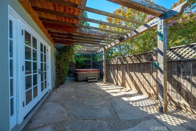 a view of backyard with sitting area