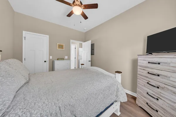 a bedroom with a bed and furniture
