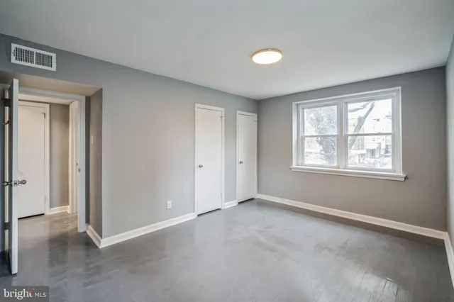 wooden floor and window in a room