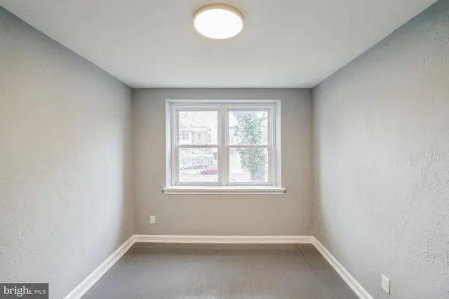 an empty room with a window