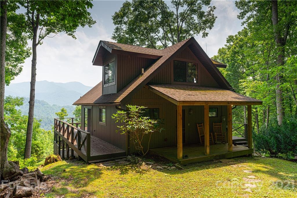 171 Jade Drive Clyde, NC 28721 - Photo 3 of 30 a front view of a house with a yard