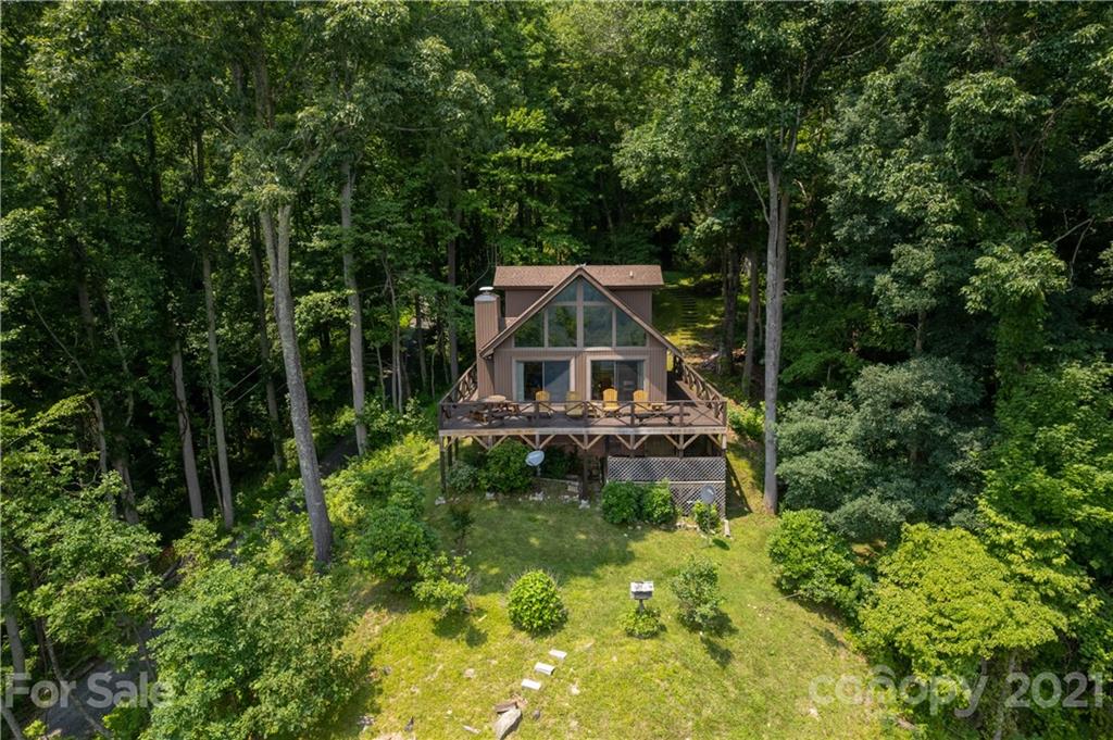 171 Jade Drive Clyde, NC 28721 - Photo 28 of 30 a aerial view of a house with a yard