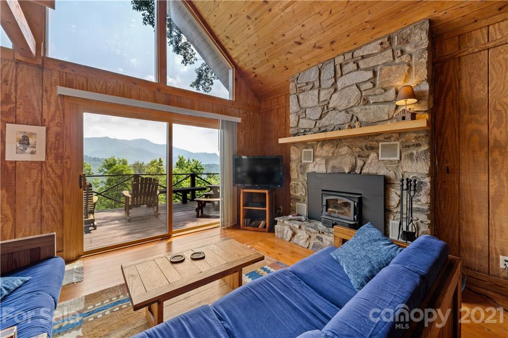 171 Jade Drive Clyde, NC 28721 - Photo 7 of 30 a living room with furniture and a fireplace