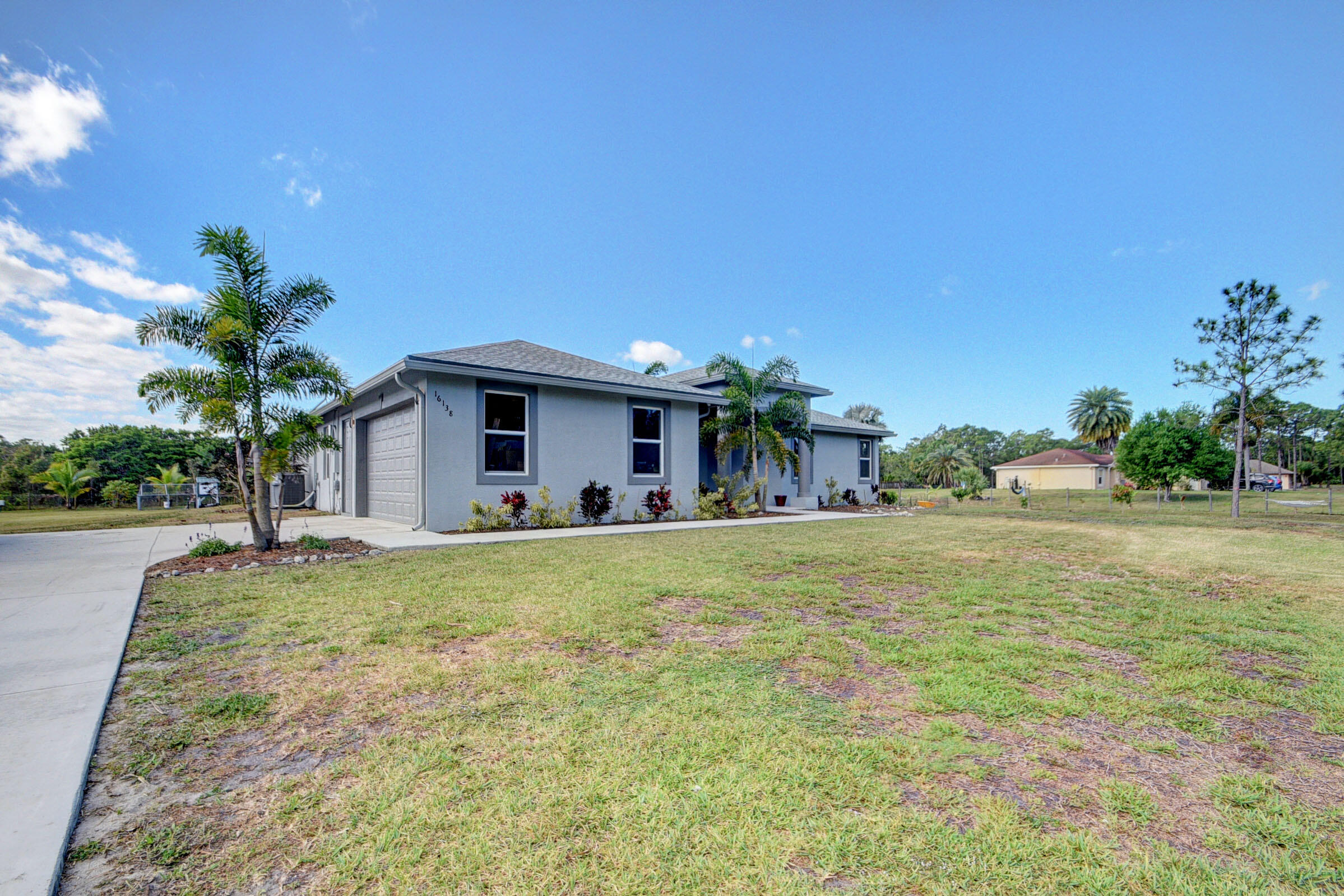 16138 93rd Road North Loxahatchee, FL 33470 - Photo 2 of 61 Front Side View