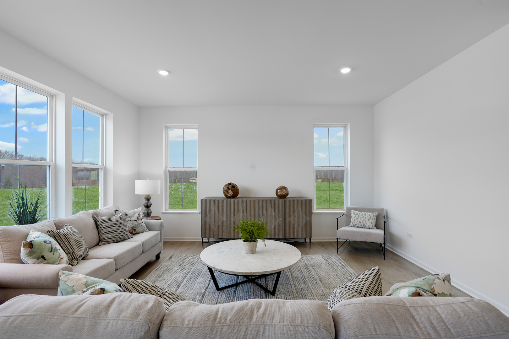 586 Lismore Circle Elgin, IL 60124 - Photo 4 of 35 a living room with furniture and a large window
