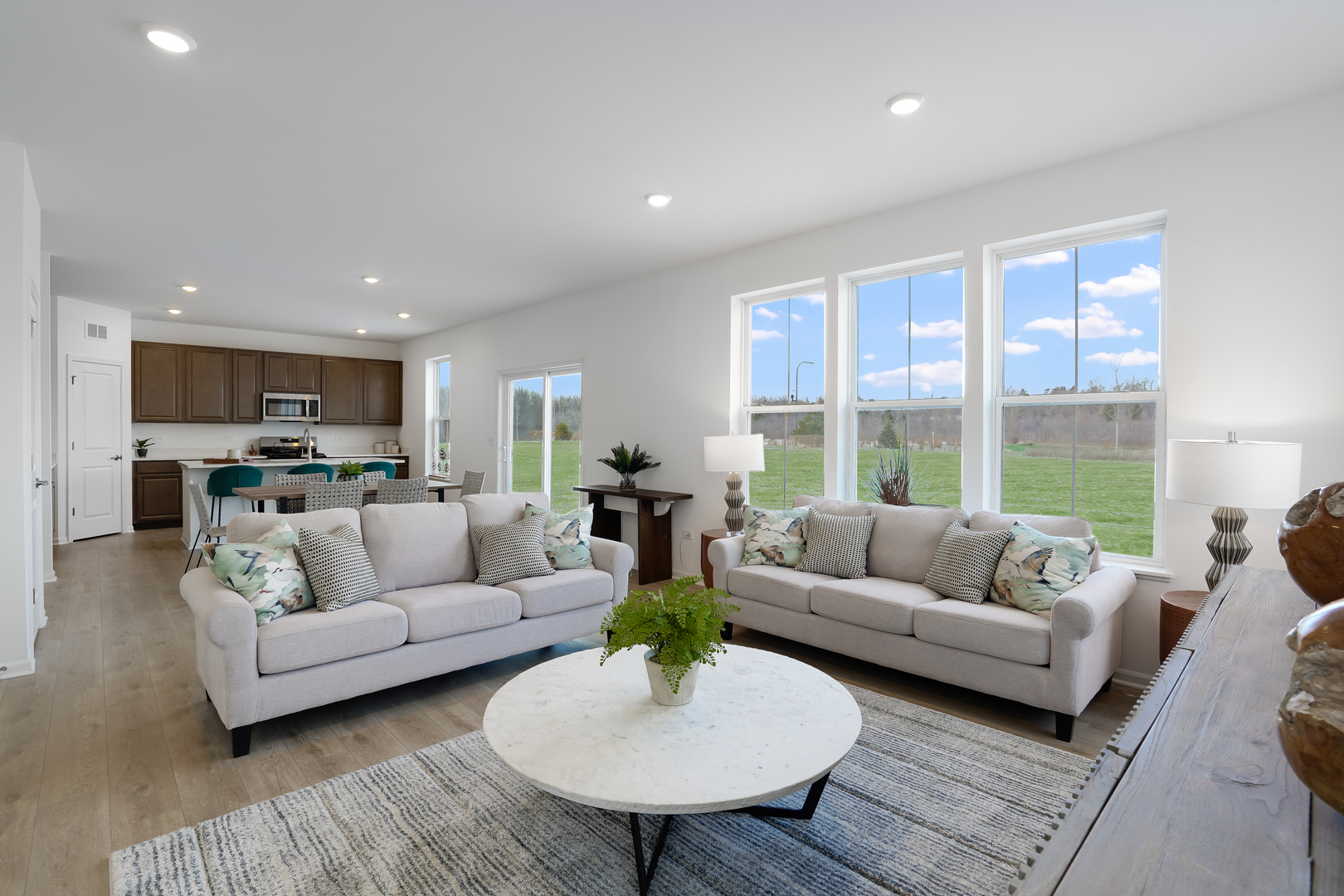 586 Lismore Circle Elgin, IL 60124 - Photo 5 of 35 a living room with furniture and a large window