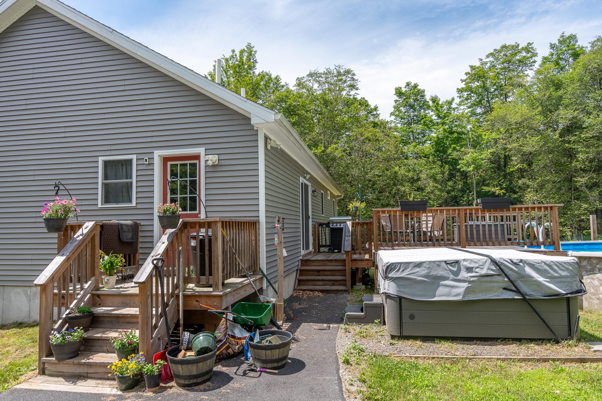 56 Ahrens Road Parksville, NY 12768 - Photo 19 of 23 Rear view of property featuring a deck