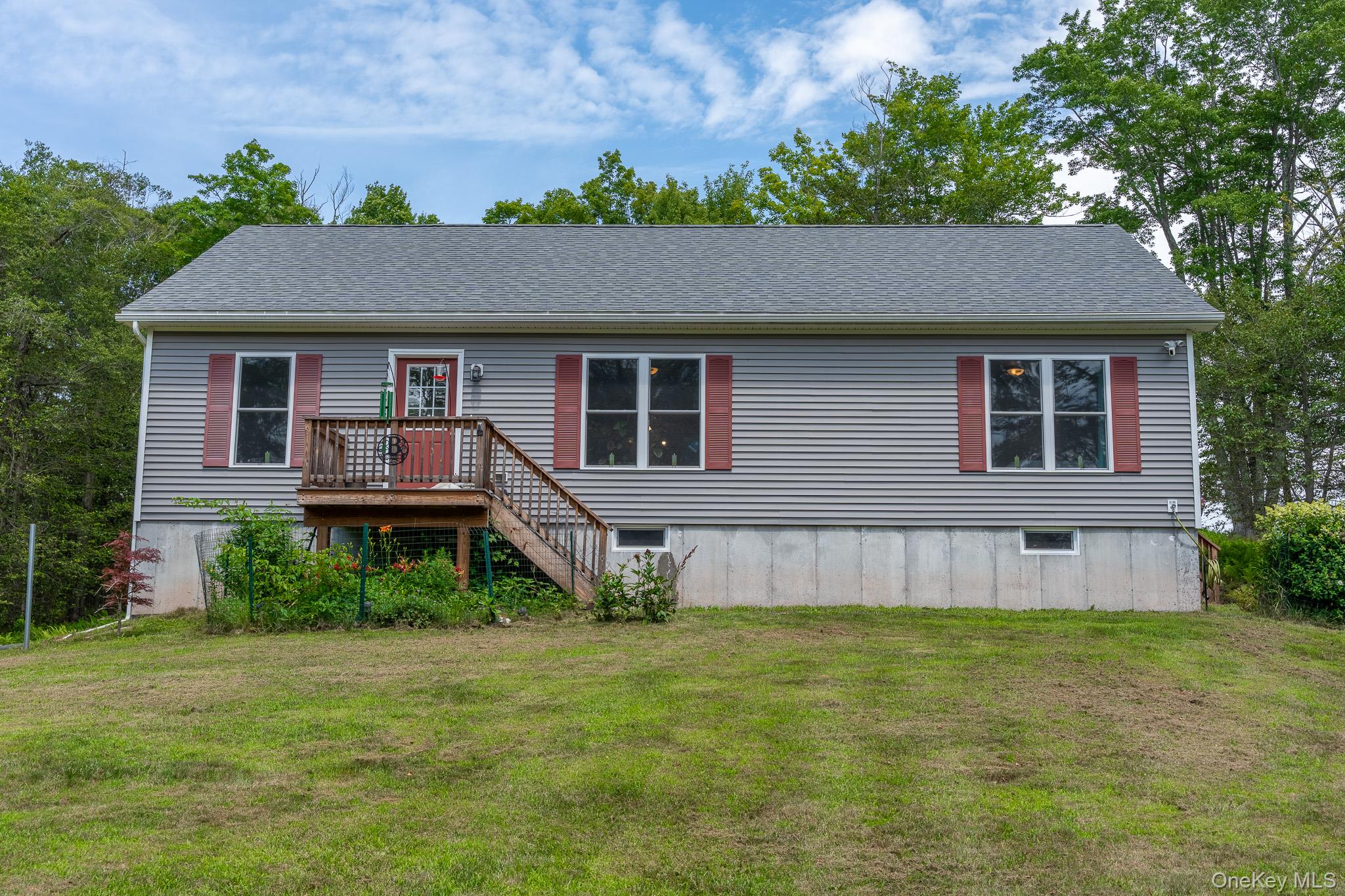 56 Ahrens Road Parksville, NY 12768 - Photo 2 of 23 a front view of a house with garden