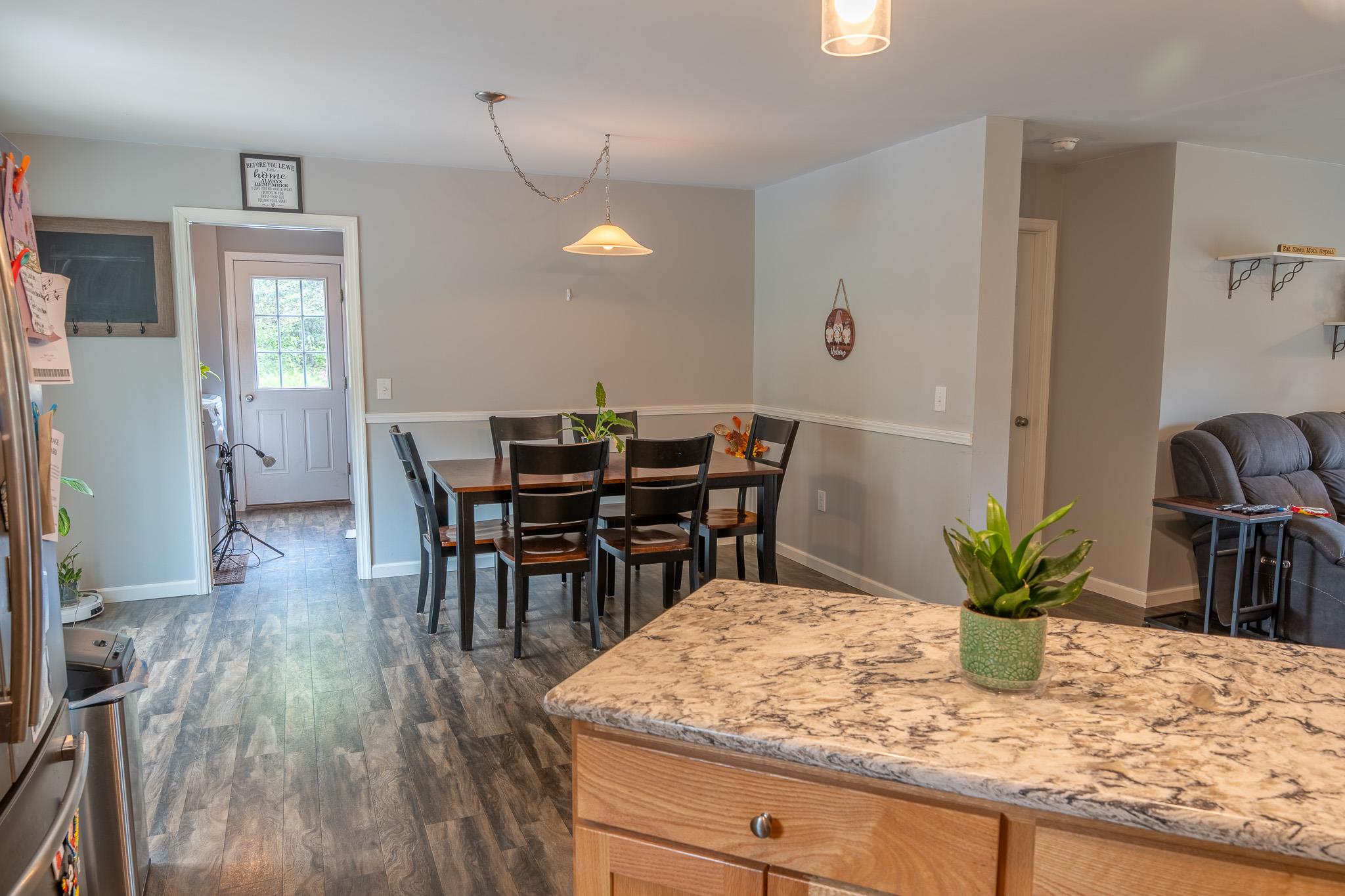 56 Ahrens Road Parksville, NY 12768 - Photo 6 of 23 Dining room with dark wood finished floors and baseboards