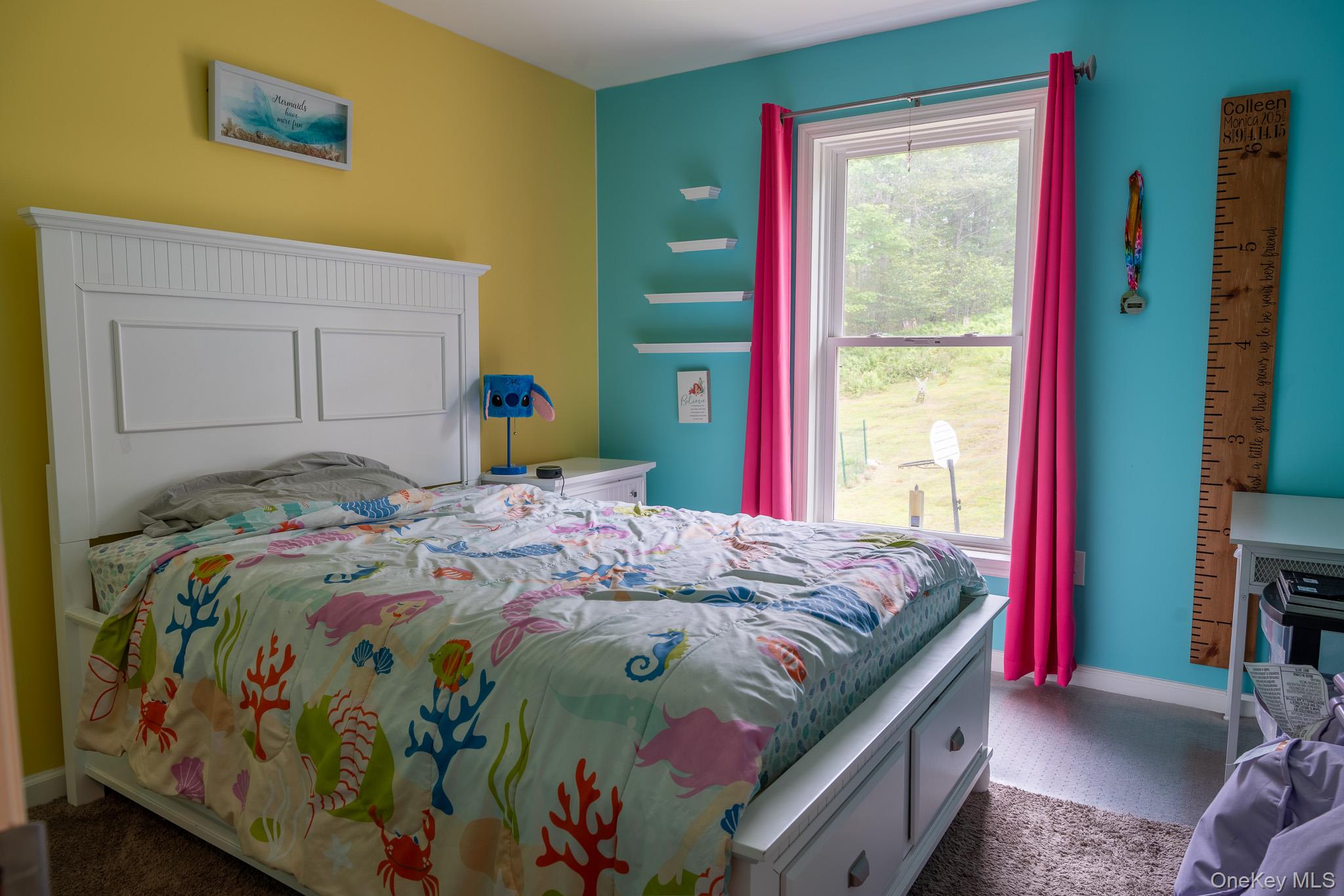 56 Ahrens Road Parksville, NY 12768 - Photo 10 of 23 a bedroom with a bed and a window