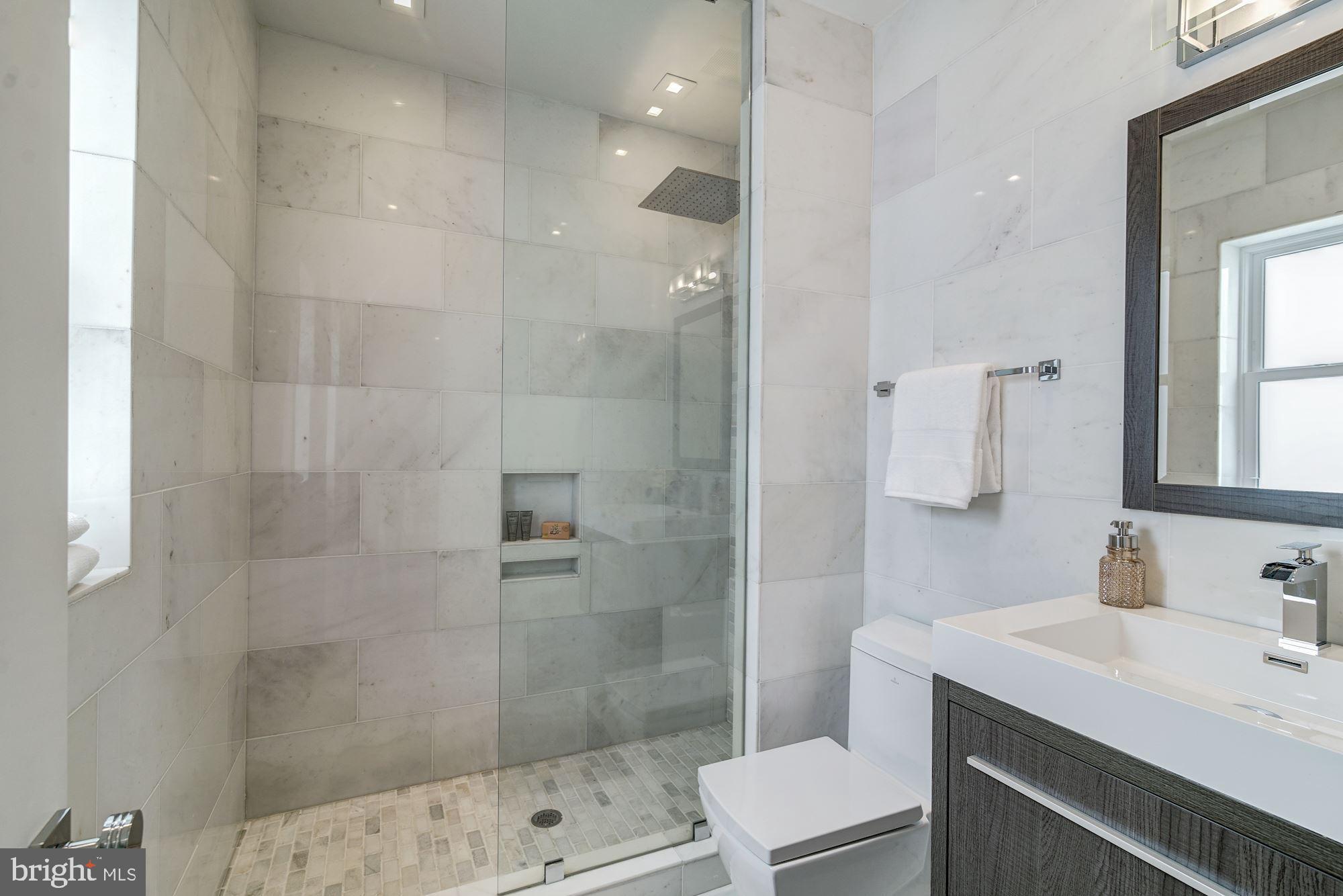 2515 Ontario Road Northwest, Unit 2 Washington, DC 20009 - Photo 29 of 42 Bathroom with marble tiles