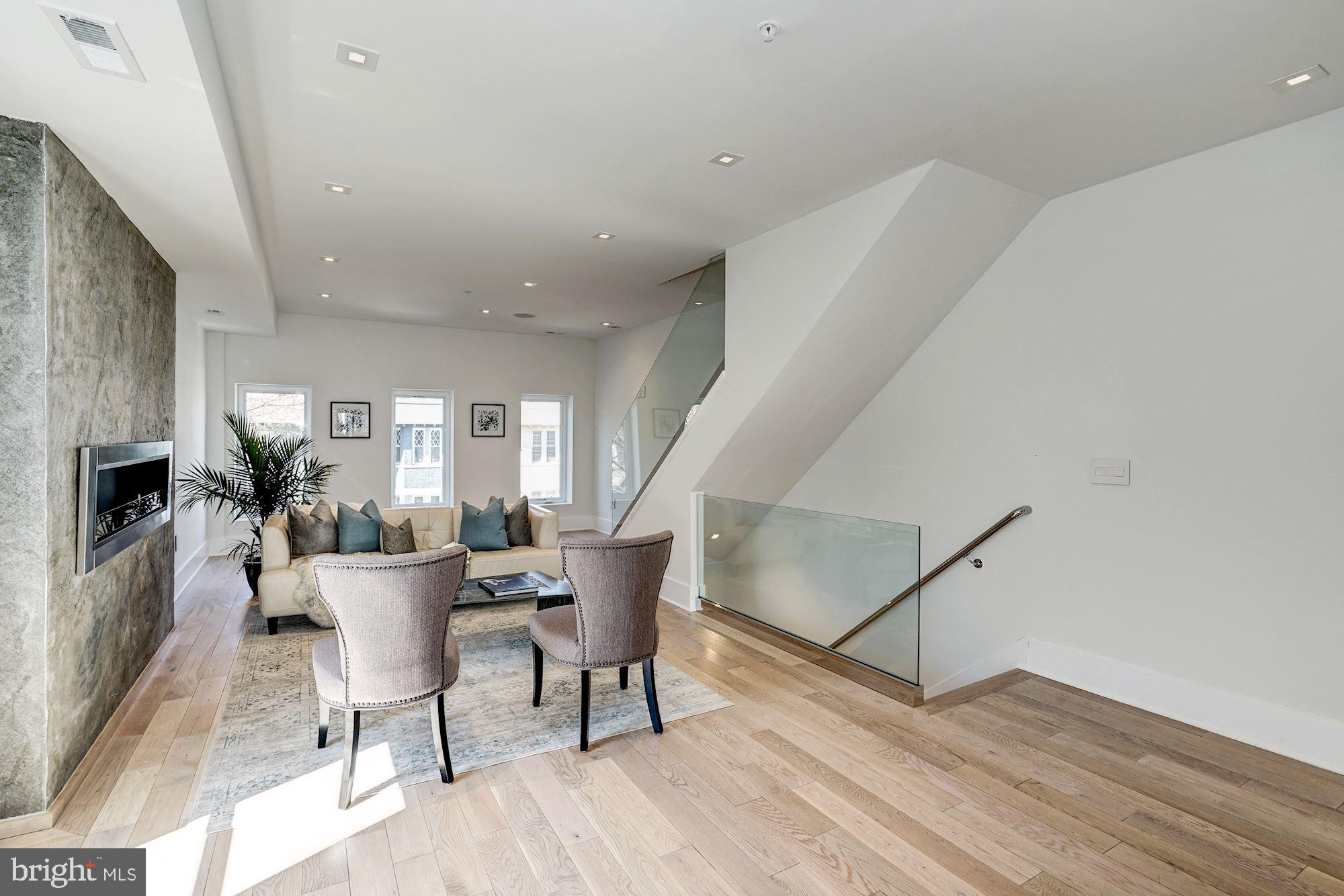2515 Ontario Road Northwest, Unit 2 Washington, DC 20009 - Photo 4 of 42 Wide plank 'glacier oak' wood floors throughout