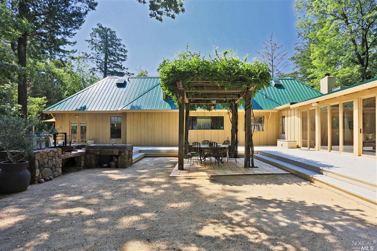 4080 Spring Mountain Road St. Helena, CA 94574 - Photo 1 of 1 a view of a house with backyard and sitting area