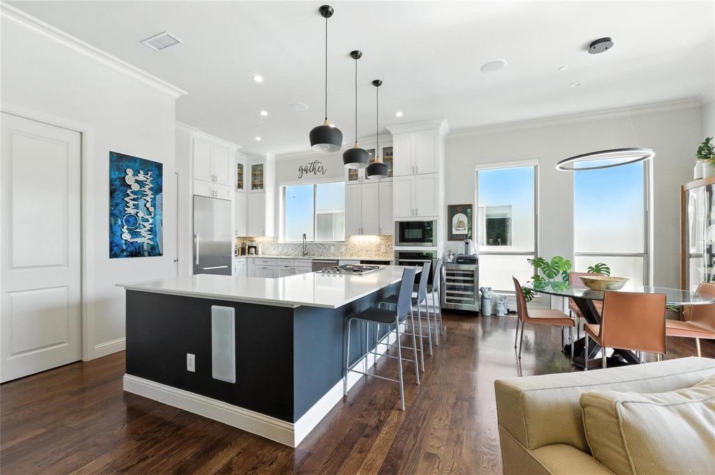 101 Decker Drive, Unit 301 Irving, TX 75062 - Photo 15 of 32 a large kitchen with lots of counter space a sink and living room view