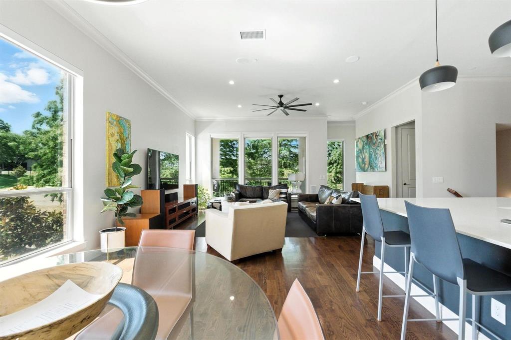 101 Decker Drive, Unit 301 Irving, TX 75062 - Photo 19 of 32 a living room with furniture and a large window