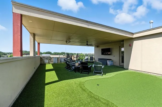 a view of yard with patio