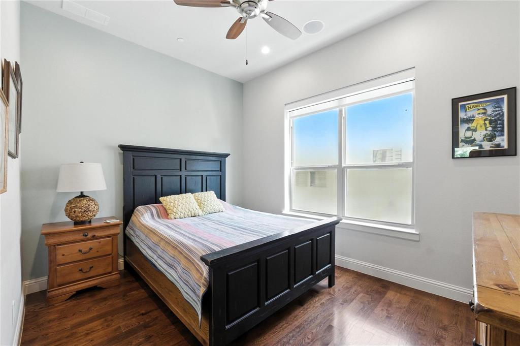 101 Decker Drive, Unit 301 Irving, TX 75062 - Photo 27 of 32 a bed sitting in a bedroom next to a window