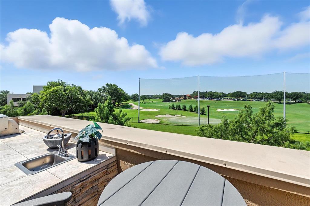 101 Decker Drive, Unit 301 Irving, TX 75062 - Photo 4 of 32 a view of a swimming pool with a porch